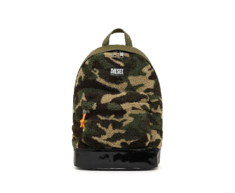 A backpack with camouflage print and black leather trim.