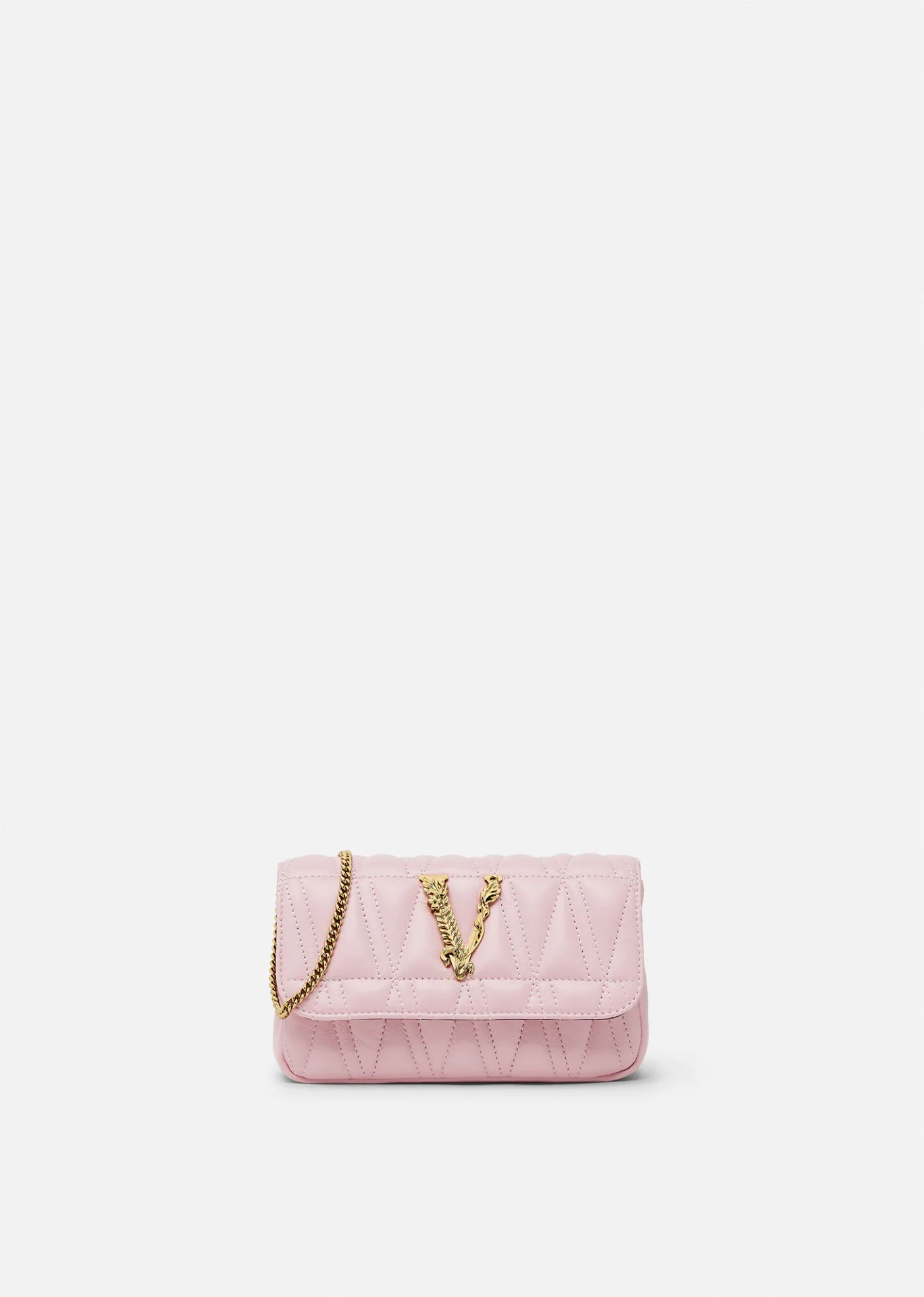 A pink purse with a v on it