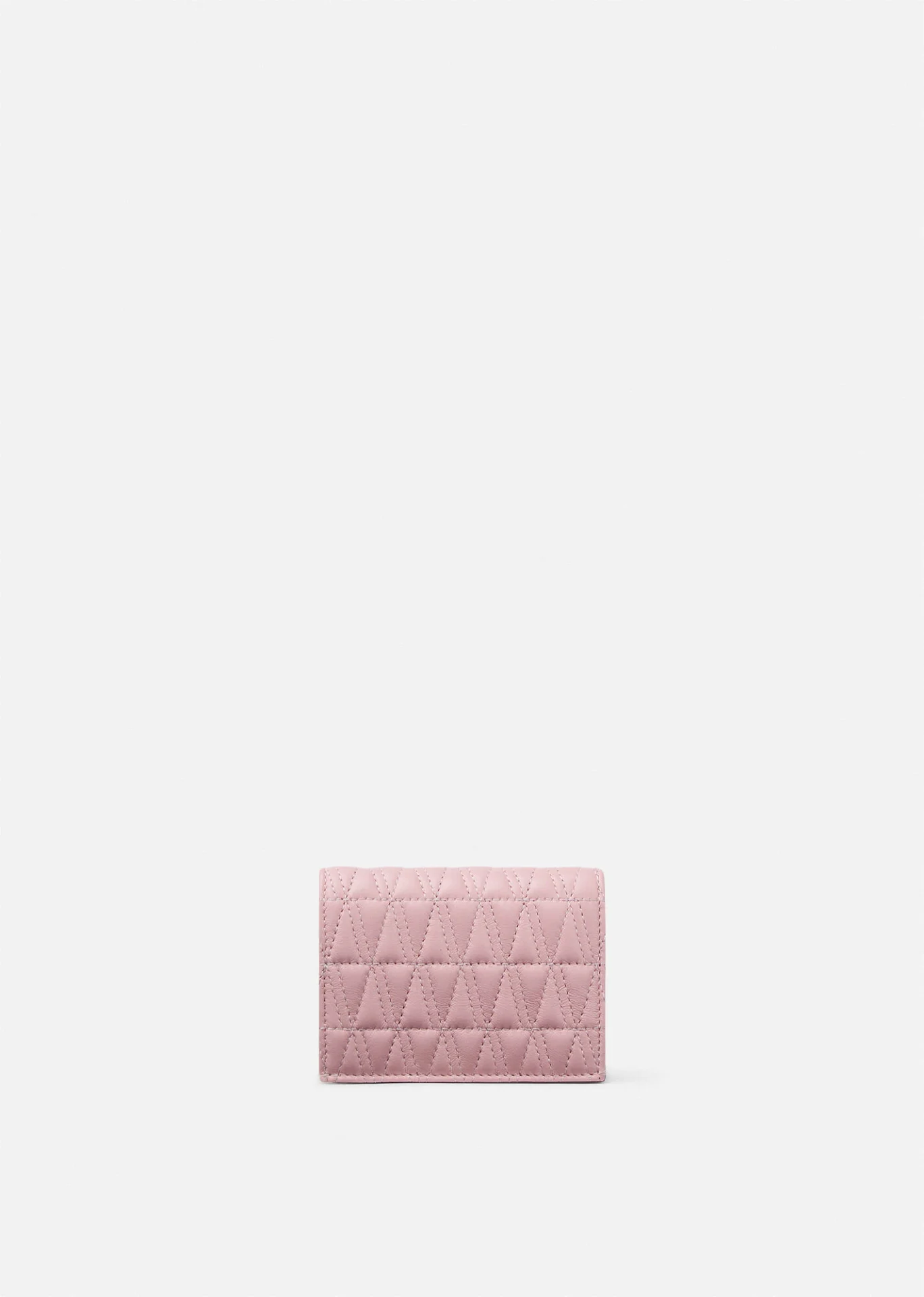 A versace quilted lambskin leather wallet in pink