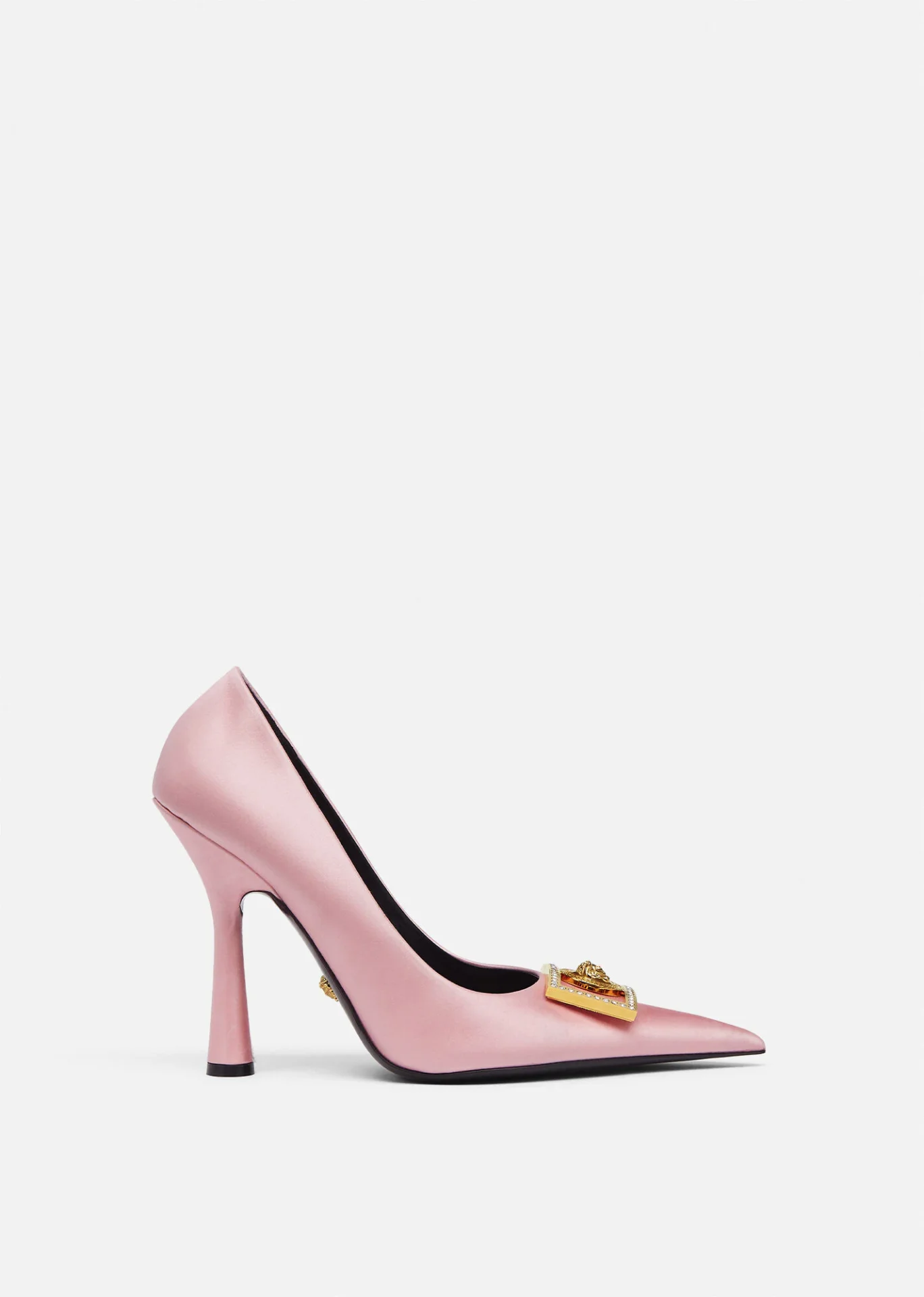 A pair of pink and golden crystal pumps