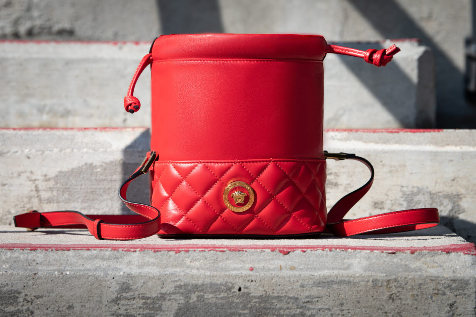 A nappy quilted medusa budget bag in red