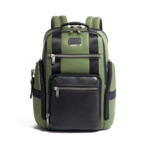 A green and black tumi sheppard deluxe bag