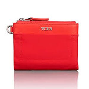 A red tumi voyageur double zip wallet