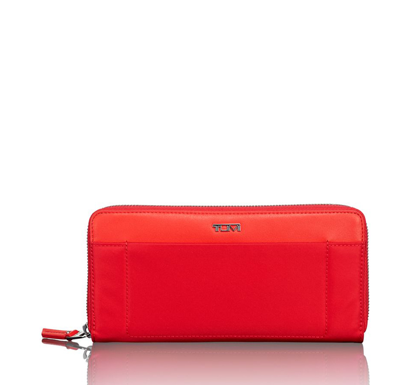 A red tumi voyageur zip around wallet