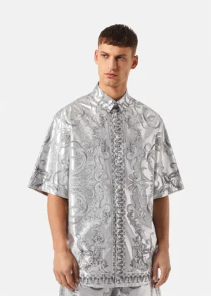 A male model wearing a silk shirt with pattern