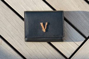 A versace virtus tri fold calf skin leather wallet