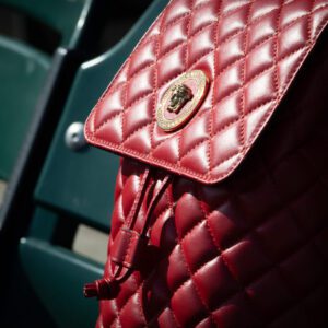 A red versace calfskin quilted medusa backpack