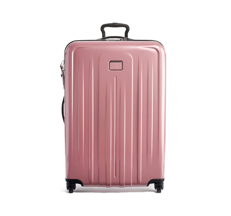 A pink suitcase is shown with no background.